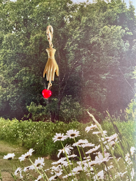 Hand & heart charm