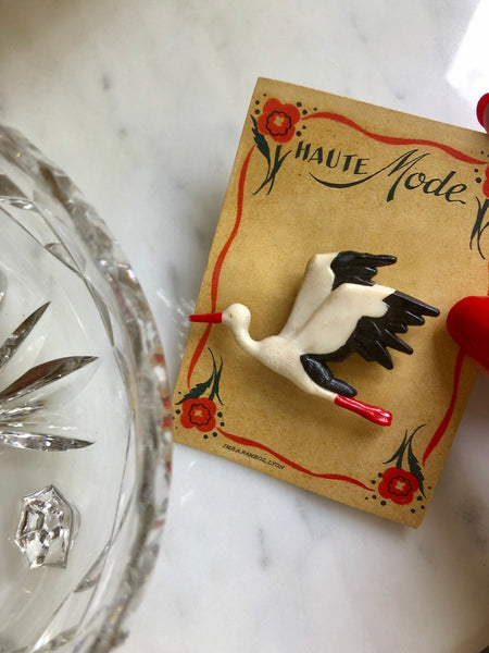 In flight French brooch